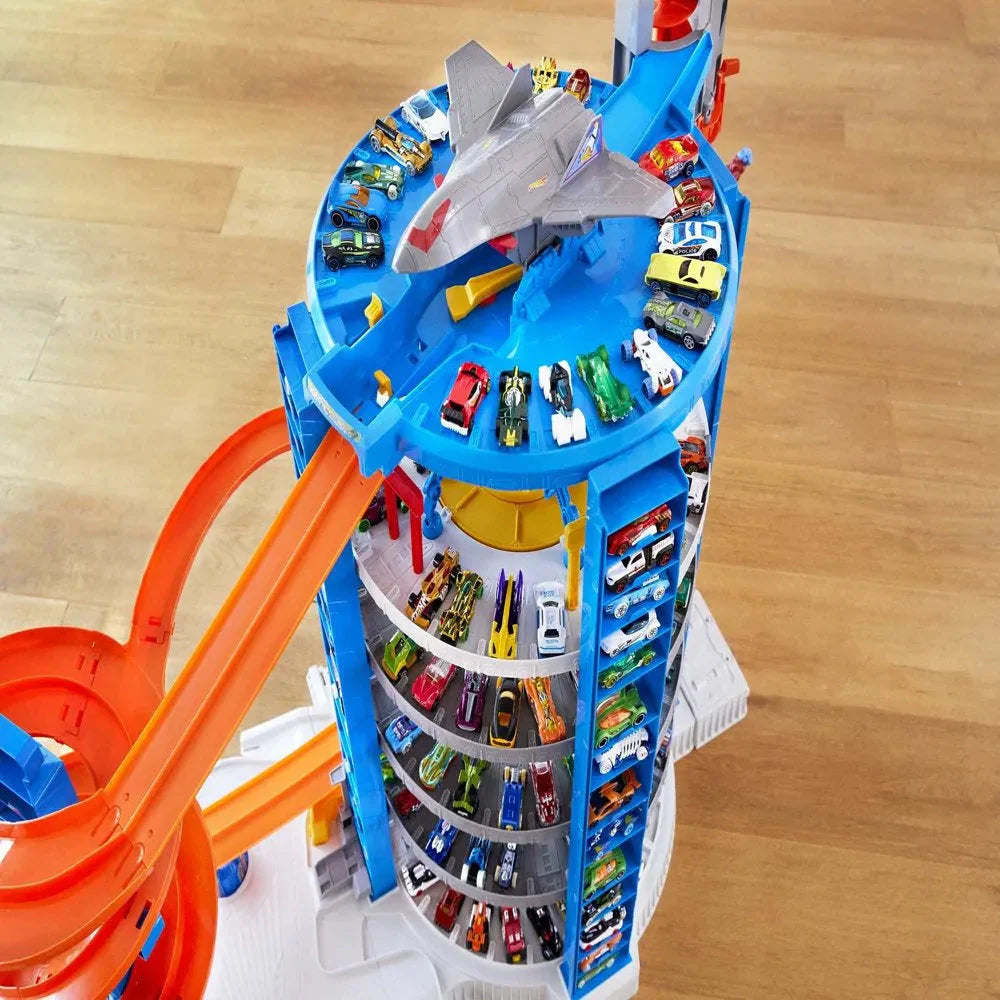 Hot Wheels Track Set with 4 1:64 Scale Toy Cars, Super Ultimate Garage, Over 3 Feet Tall